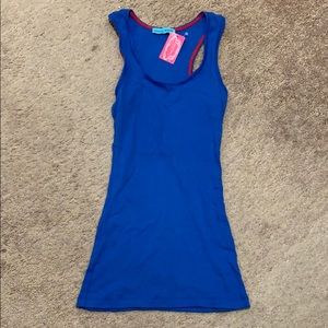 Nicole Marie Racerback Tank. 100% cotton. Size M